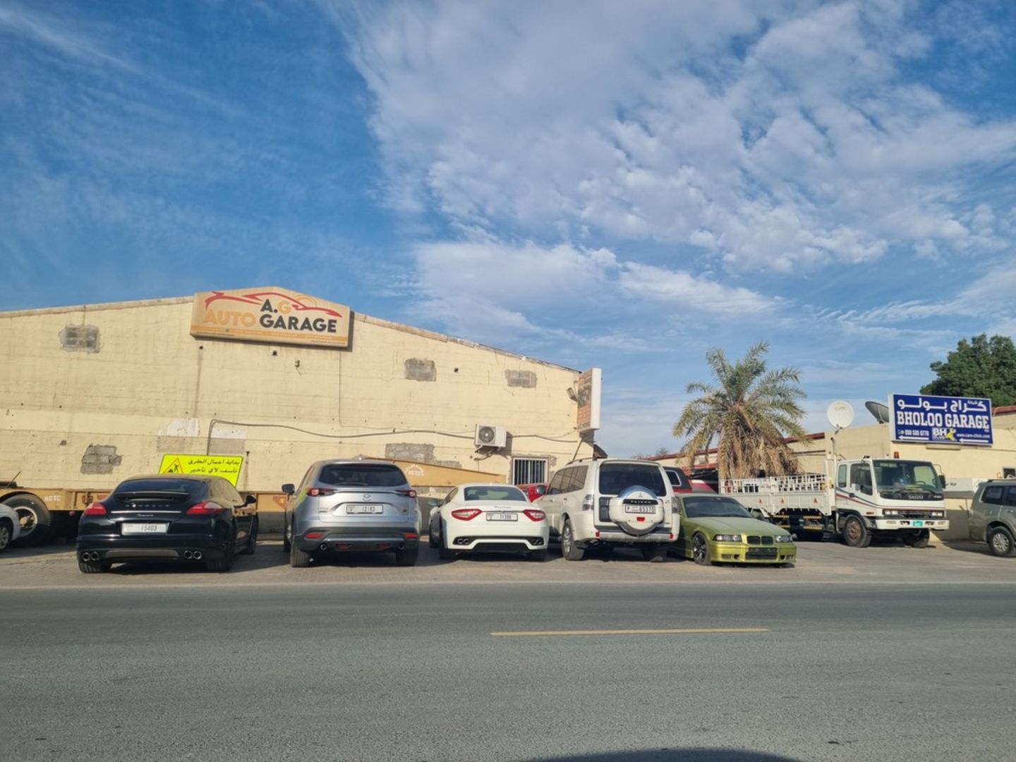 HiDubai-business-ali-mumtaz-auto-repairing-transport-vehicle-services-auto-spare-parts-accessories-umm-ramool-dubai