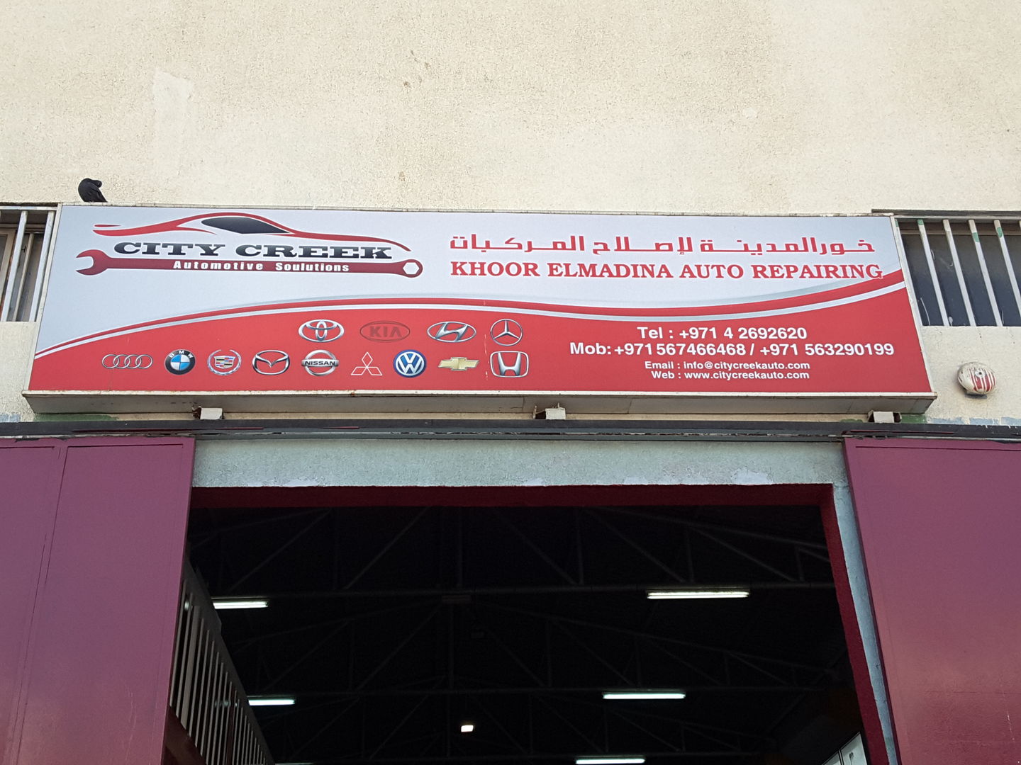 HiDubai-business-khoor-el-madina-auto-repairing-transport-vehicle-services-car-assistance-repair-al-khabaisi-dubai