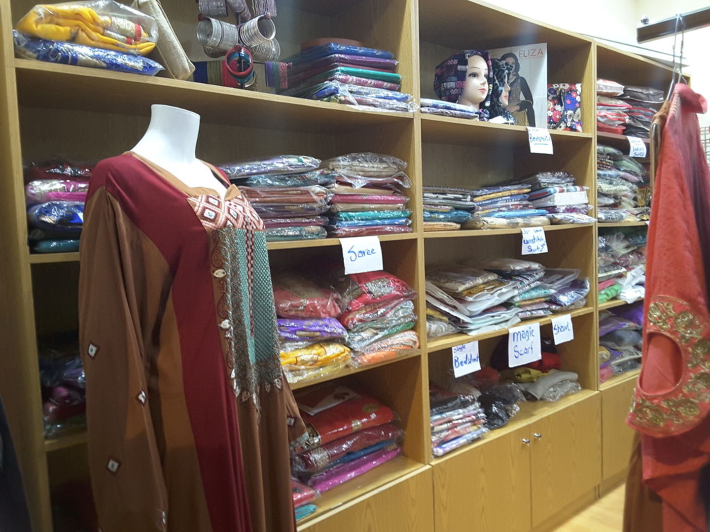 HiDubai-business-maha-rashed-readymade-garments-trading-shopping-apparel-naif-dubai-2