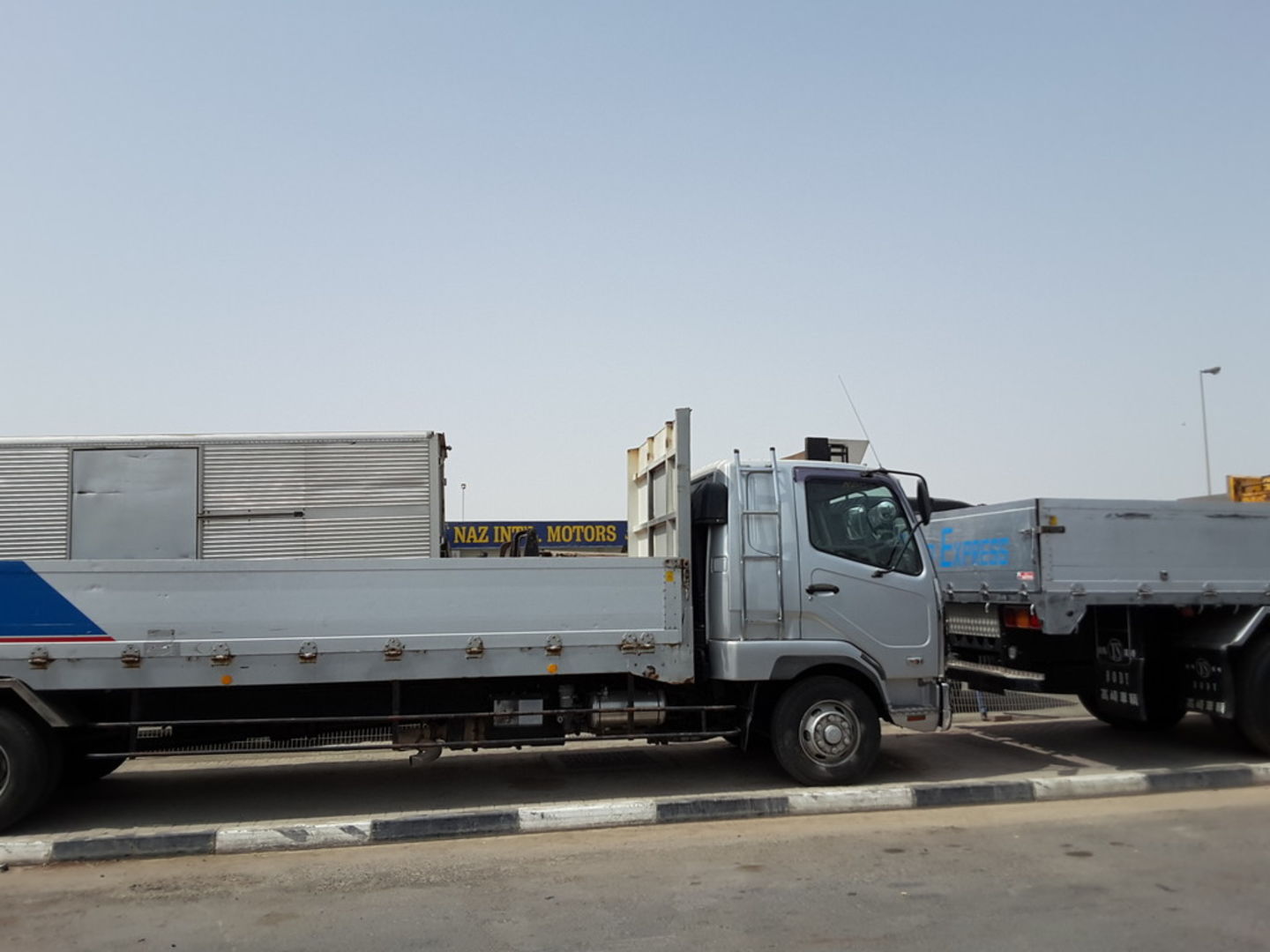 HiDubai-business-naz-international-motors-transport-vehicle-services-used-car-dealers-ras-al-khor-industrial-3-dubai-2