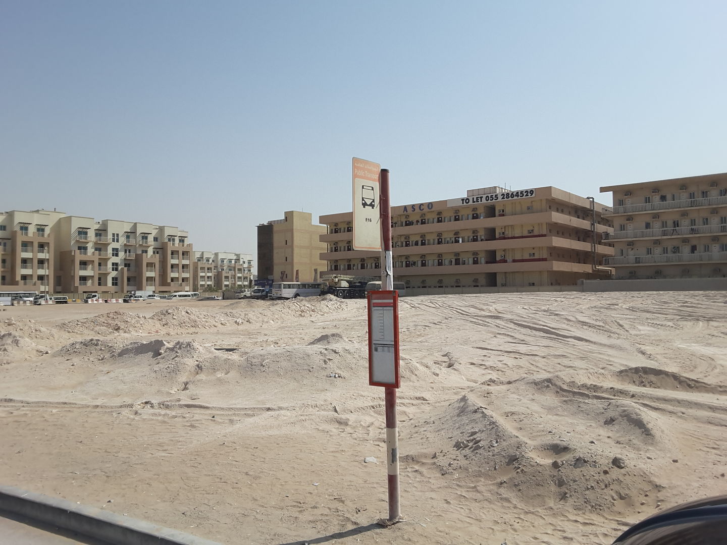 HiDubai-business-quoz-al-waaha-street-asco-labour-camp-1-bus-stop-transport-vehicle-services-public-transport-al-quoz-3-dubai-2