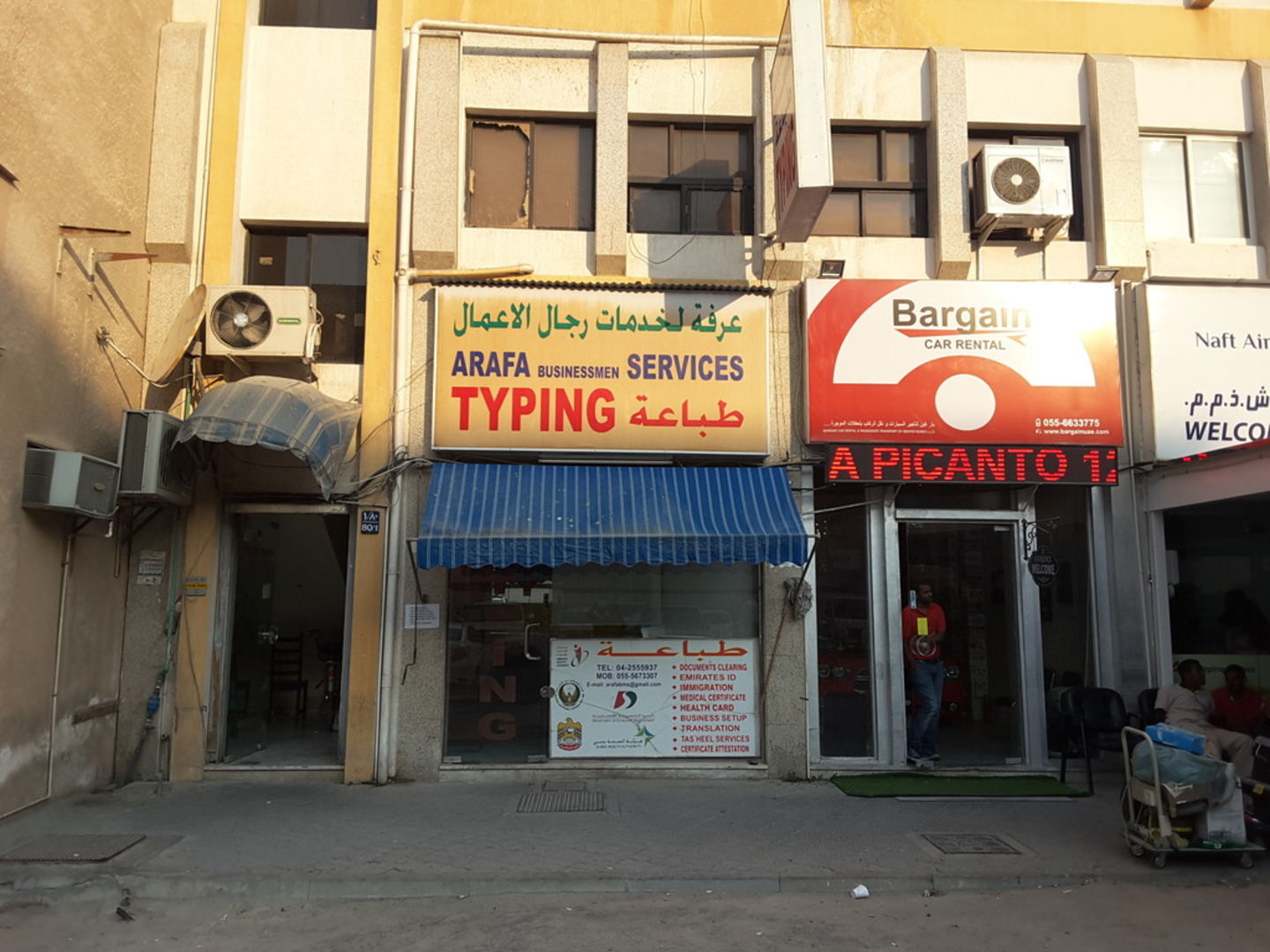 HiDubai-business-arafa-typing-businessmen-services-b2b-services-business-setup-and-pros-naif-dubai