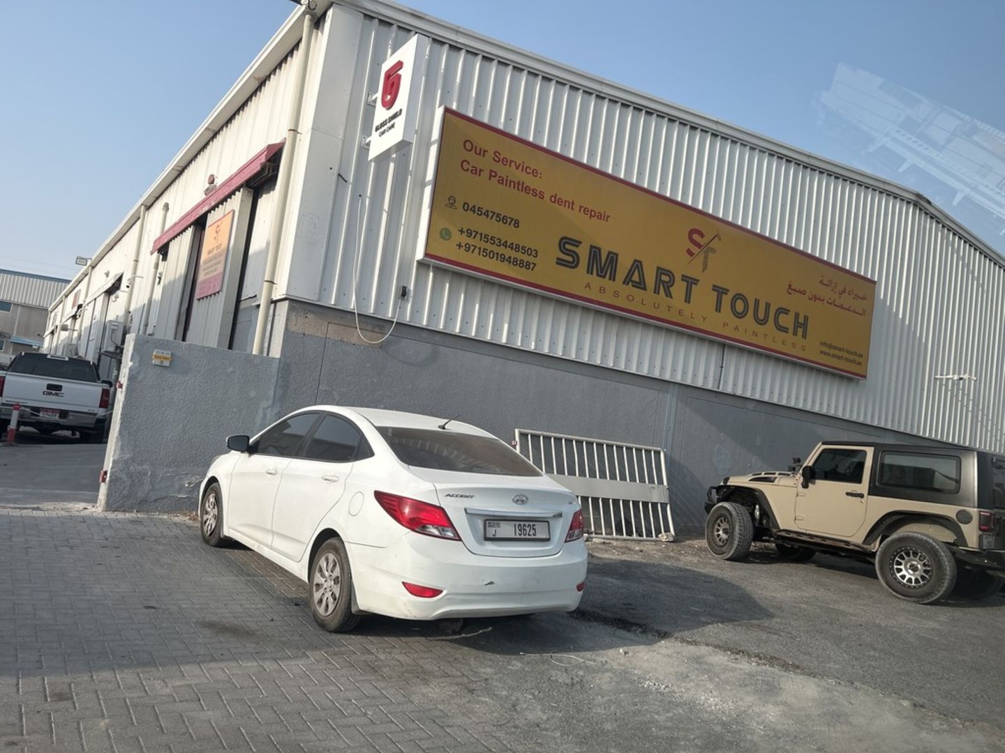 HiDubai-business-smart-touch-absolutely-paintless-transport-vehicle-services-car-assistance-repair-al-qusais-industrial-3-dubai